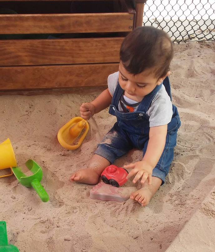 child in sandbox